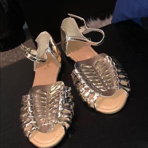 Metallic gold gladiator sandals